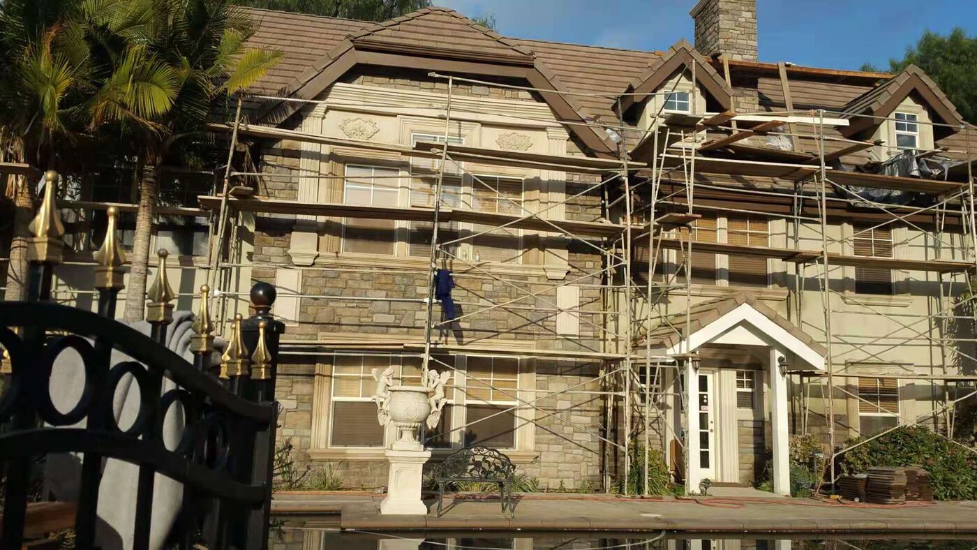 House renovation under scaffolding