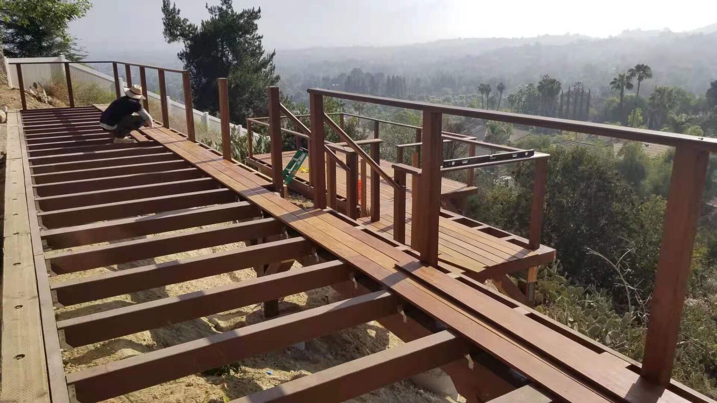 Redwood hillside deck framing