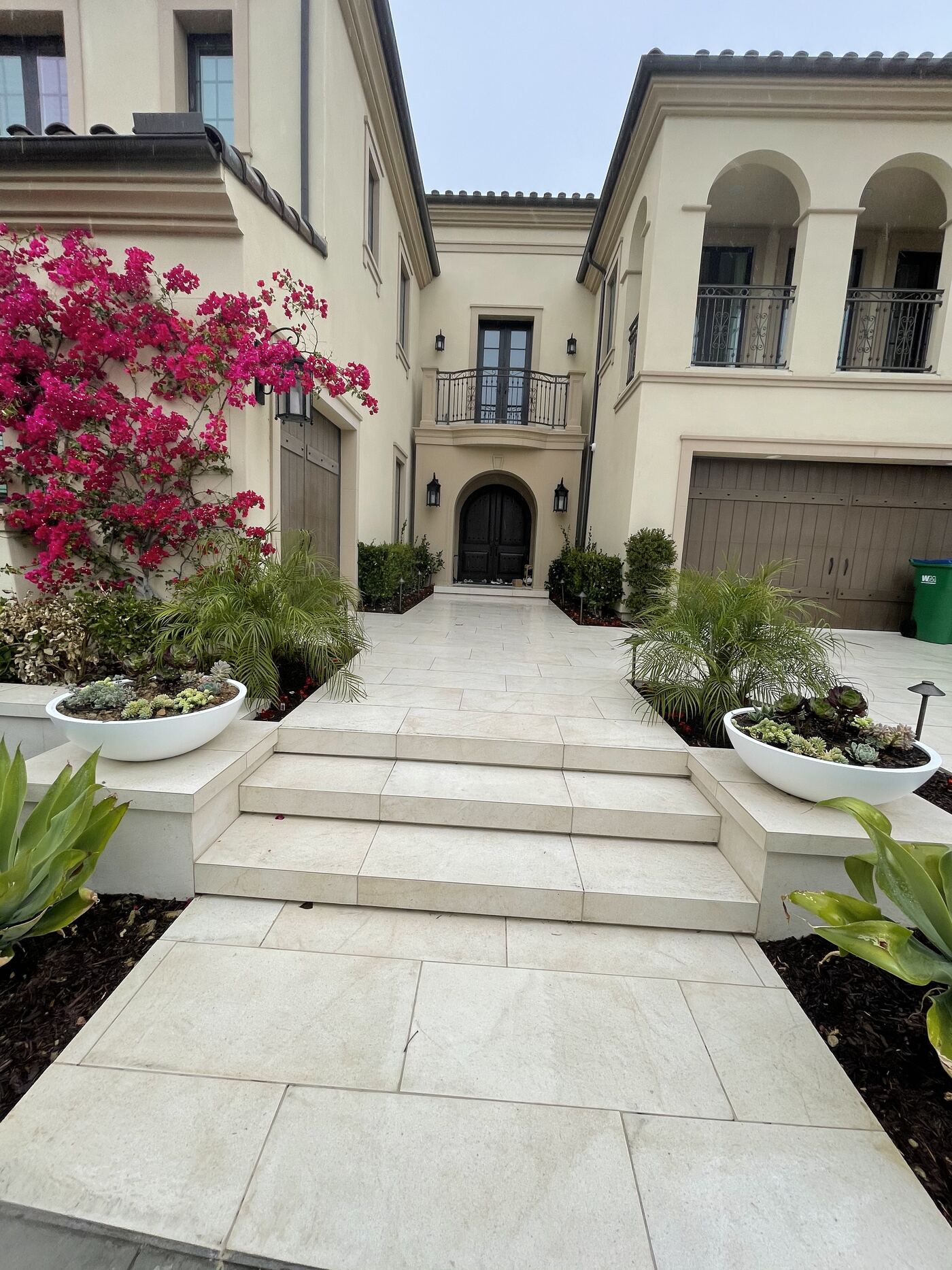 Front garden beds along a walkway