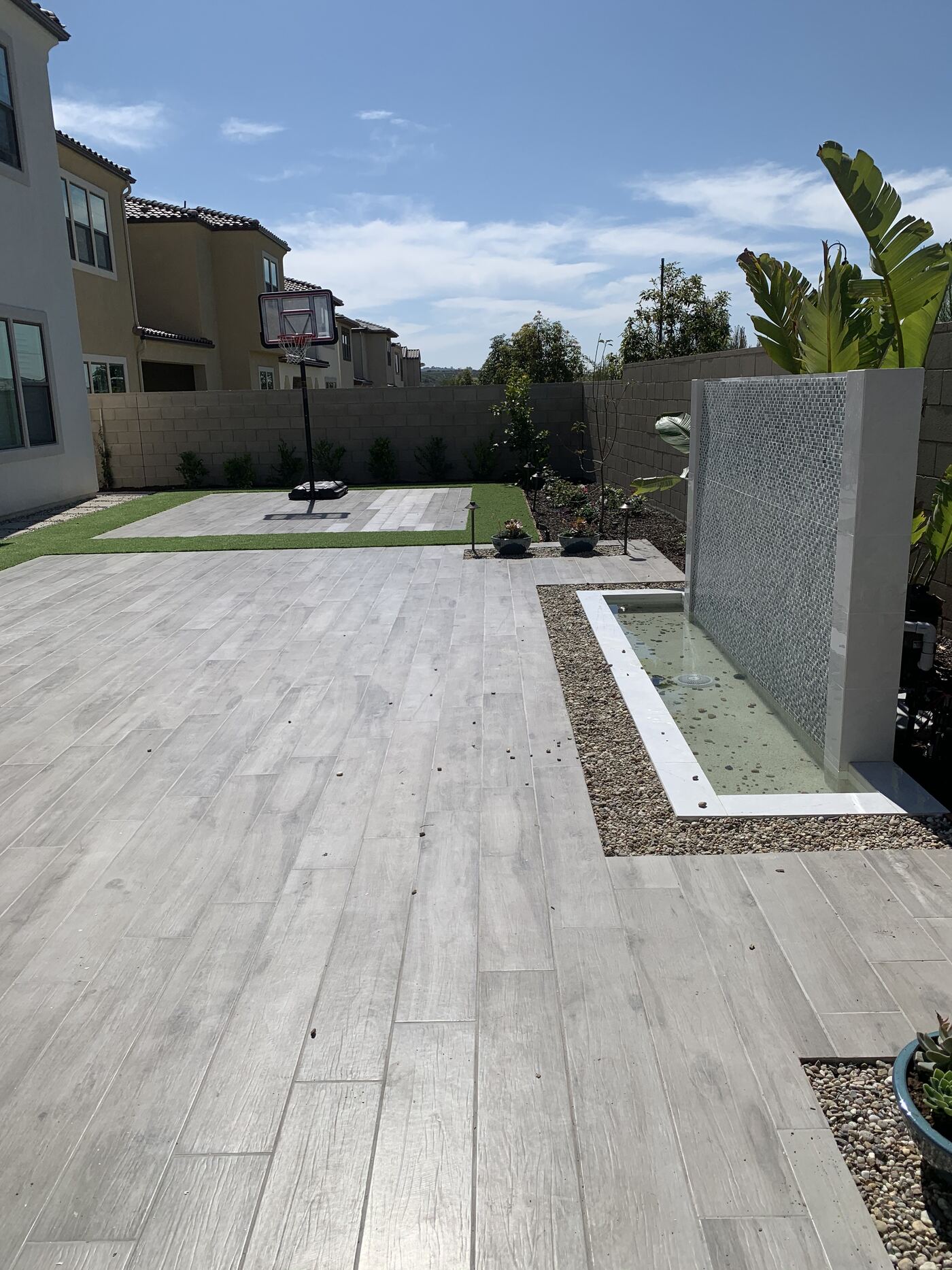 Stone water wall on a covered patio